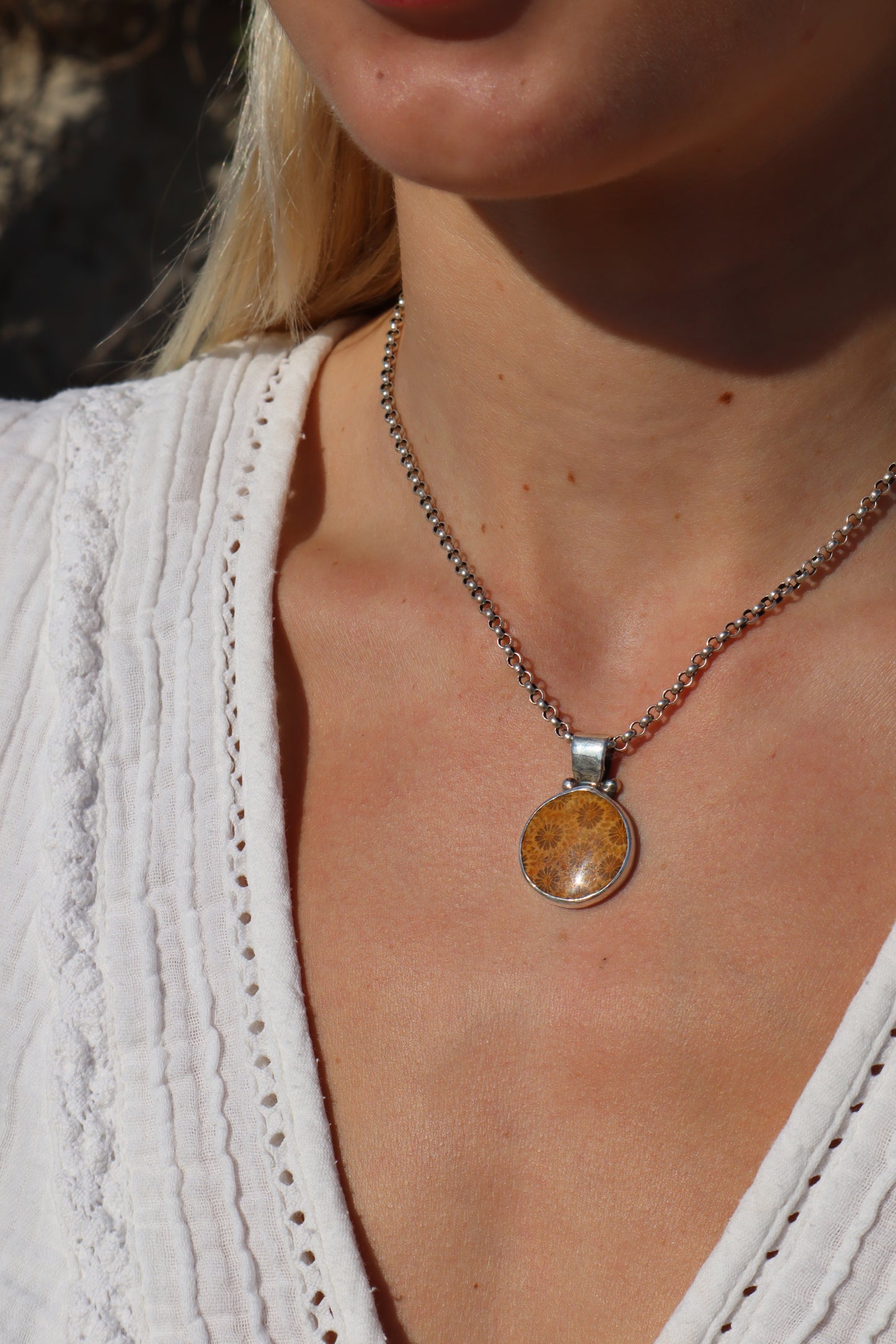 Fossilised Coral Manta Ray Pendant