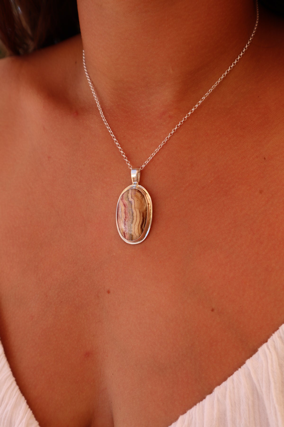 Rhodochrosite Mirror Pendant