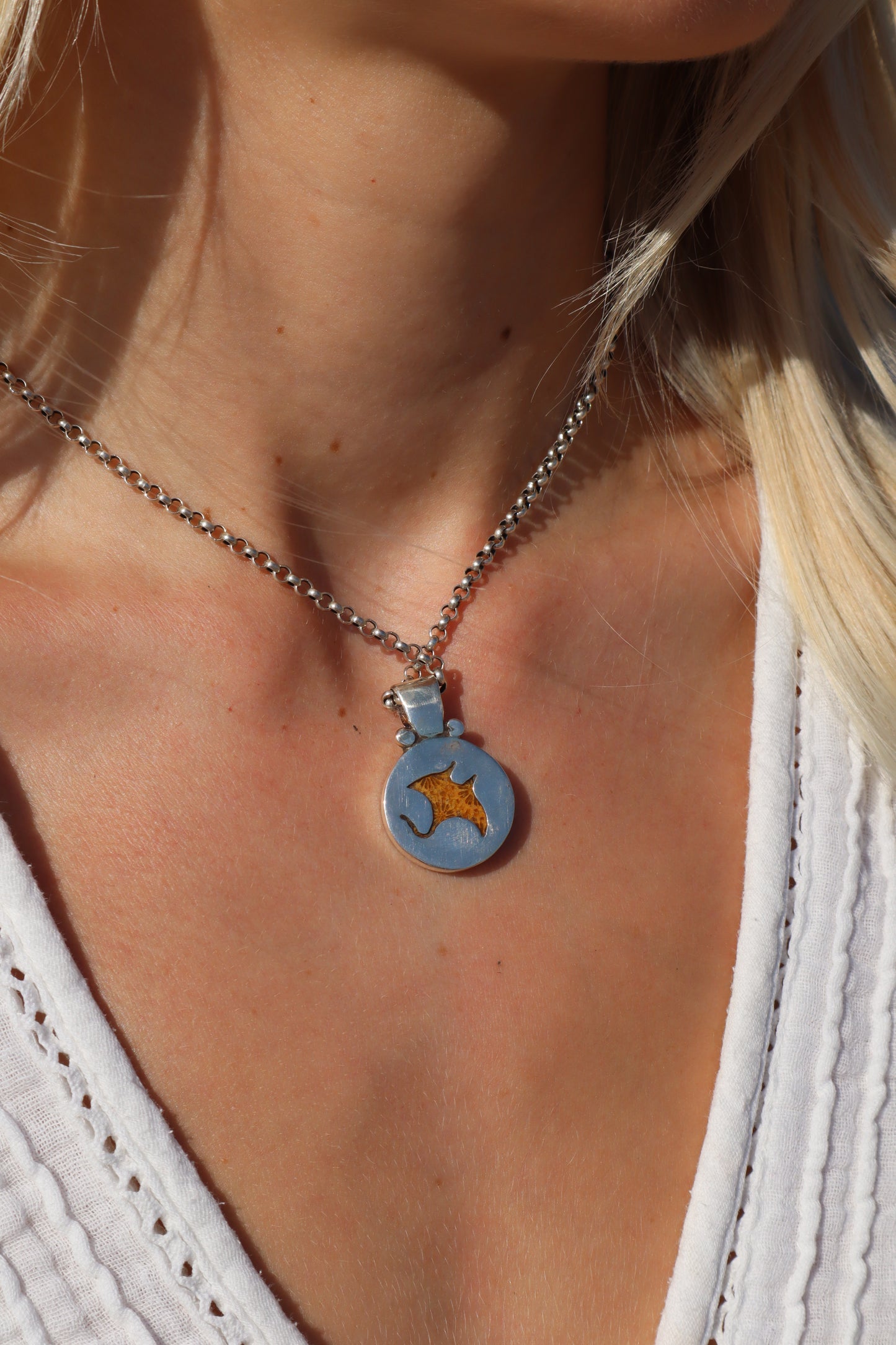 Fossilised Coral Manta Ray Pendant