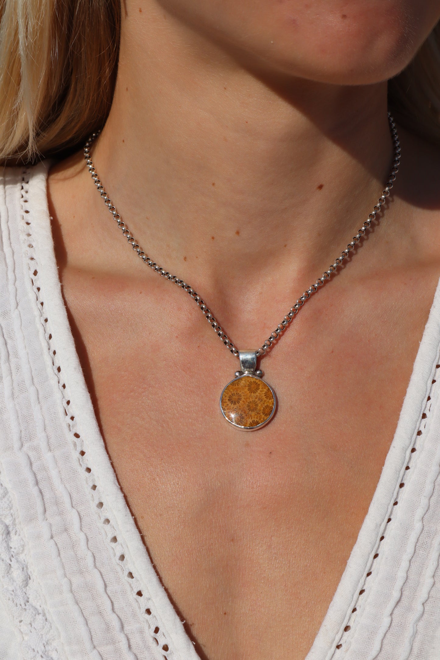 Fossilised Coral Manta Ray Pendant