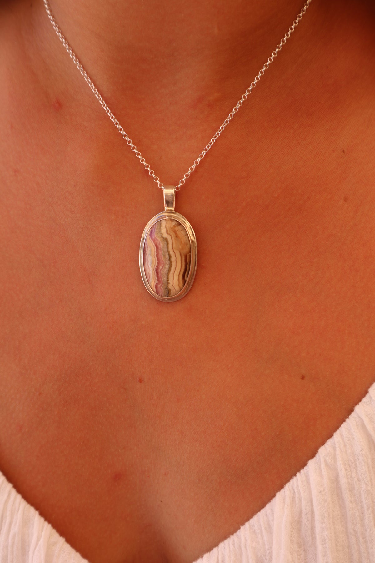 Rhodochrosite Mirror Pendant